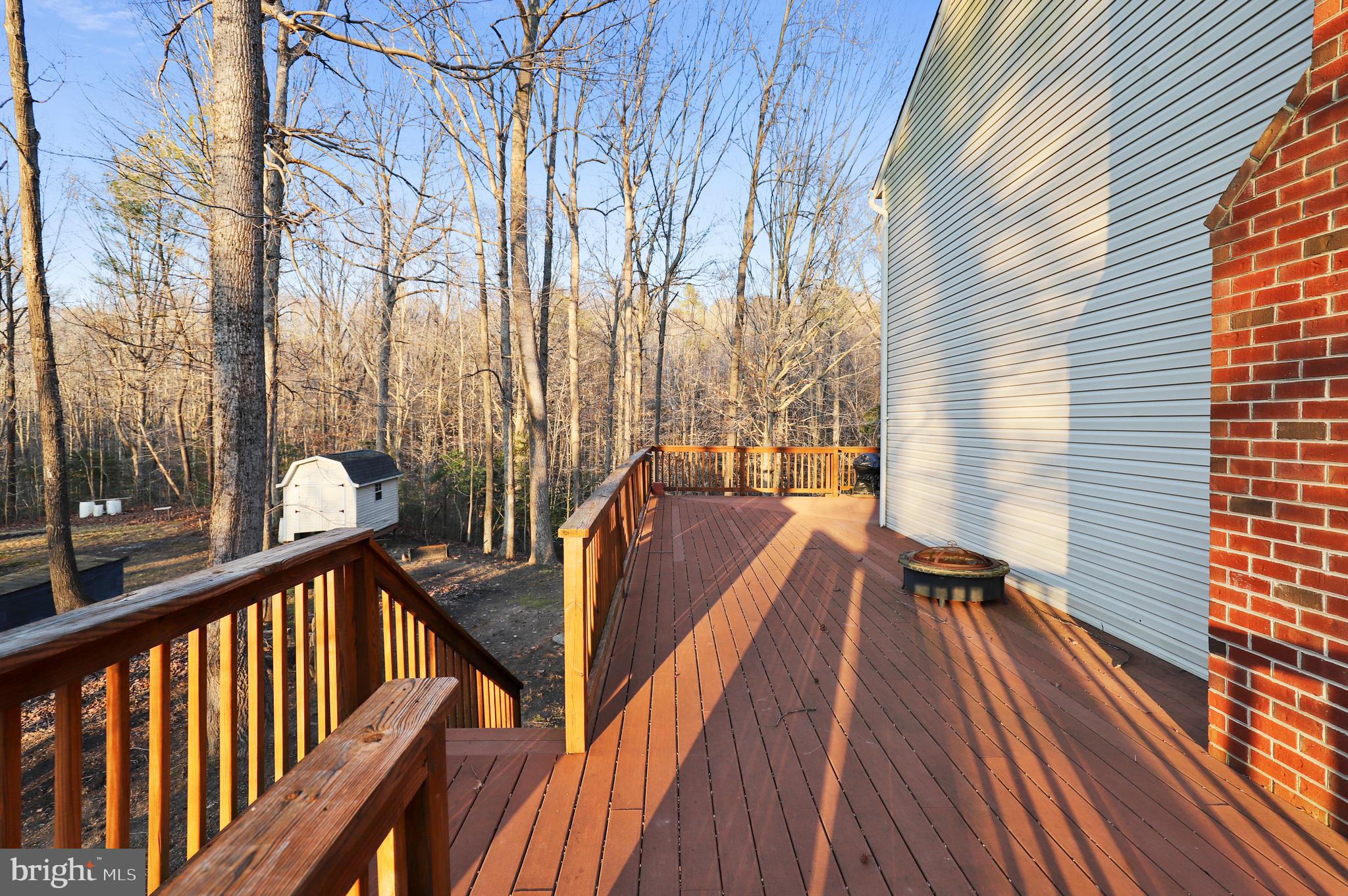 385 Ball Road St. Leonard, MD 20685 - Photo 40 of 52 Deck - 2 stairs leading to front and rear yard