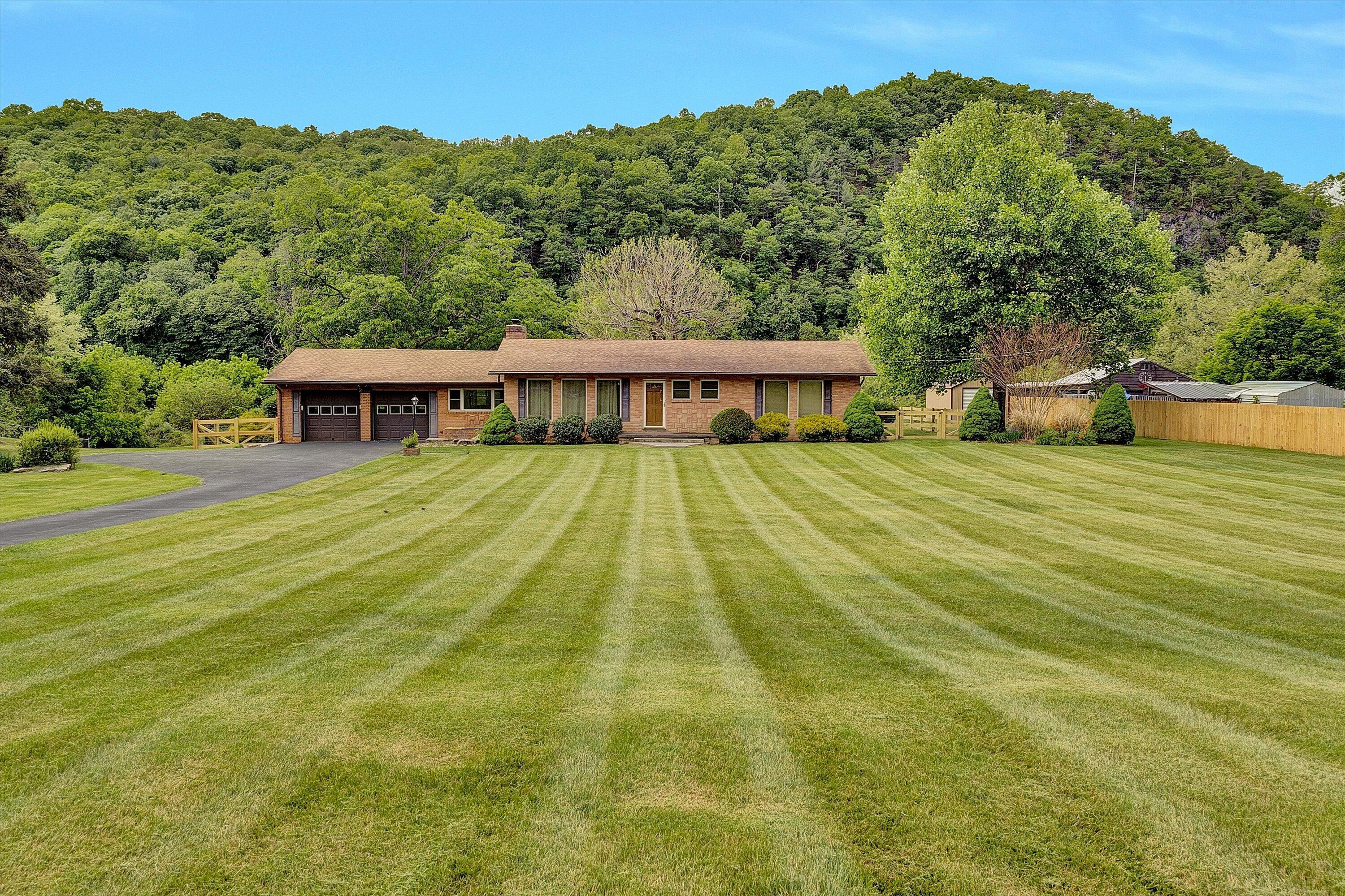 2015 Evergreen Road Covington, VA 24426 - Photo 1 of 46 a view of a house with a backyard
