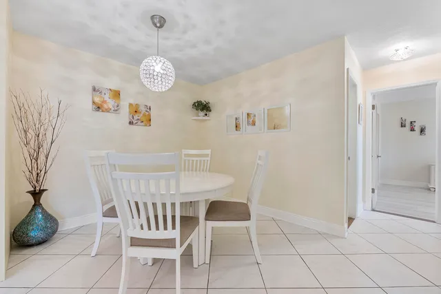 a view of dining room and wooden floor