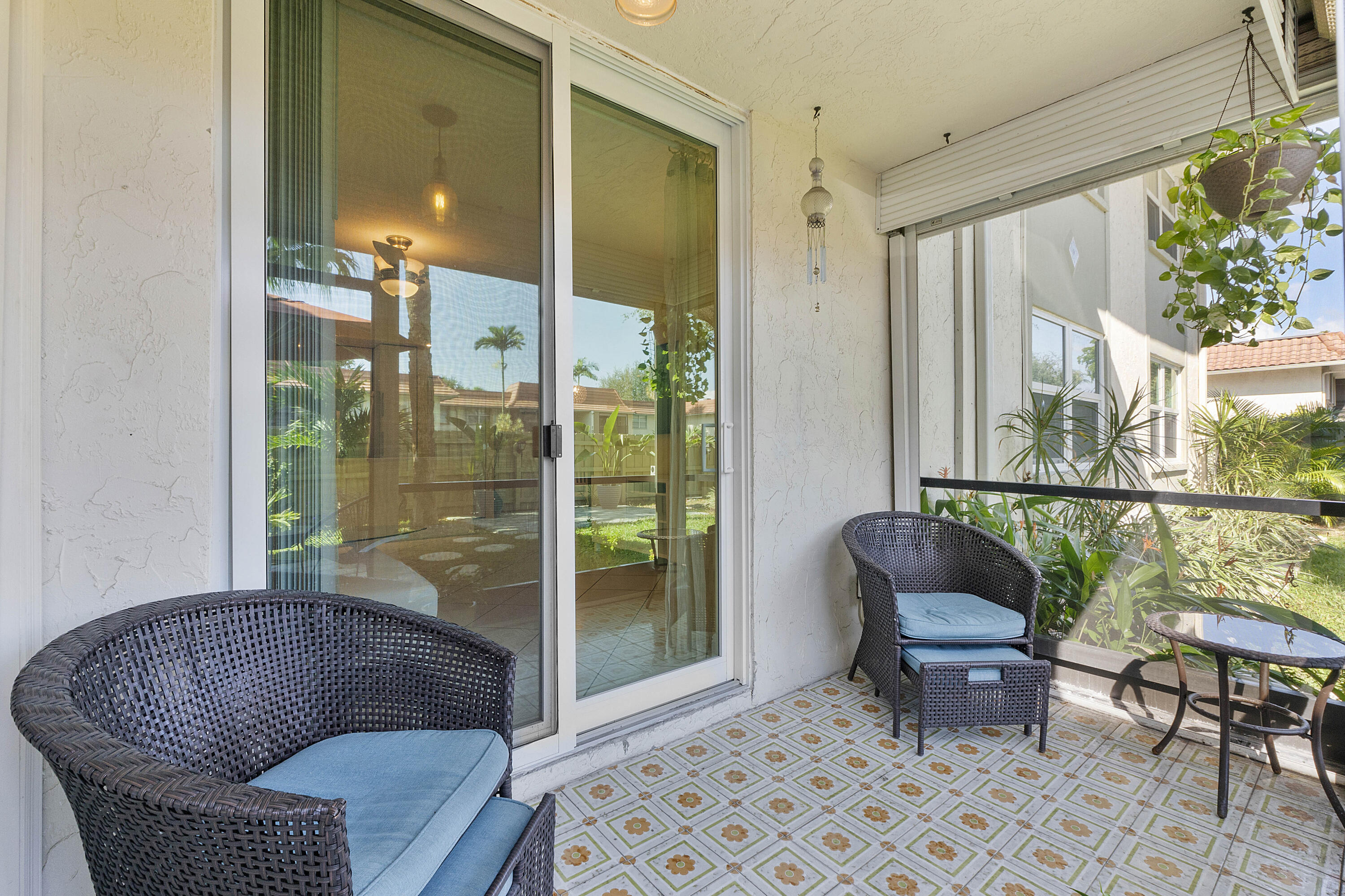 1100 Northwest 13th Street, Unit 192D Boca Raton, FL 33486 - Photo 14 of 42 a living room with furniture and a window