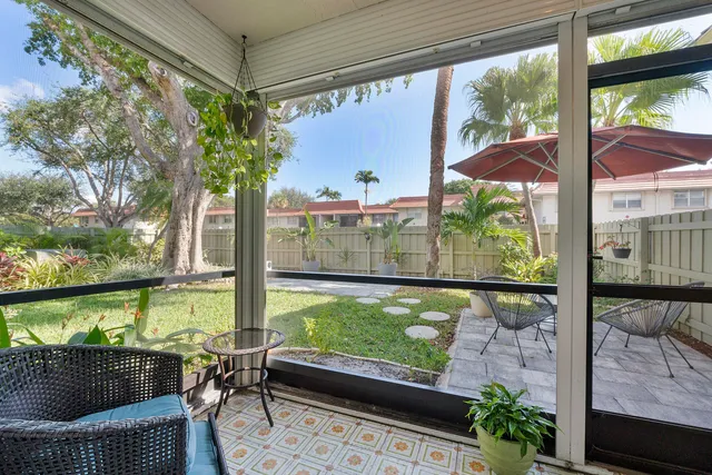 a view of a porch with furniture