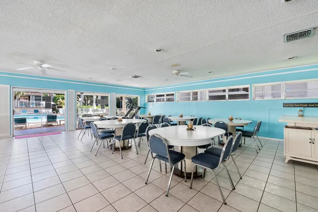 a view of entryway hall and wooden floor