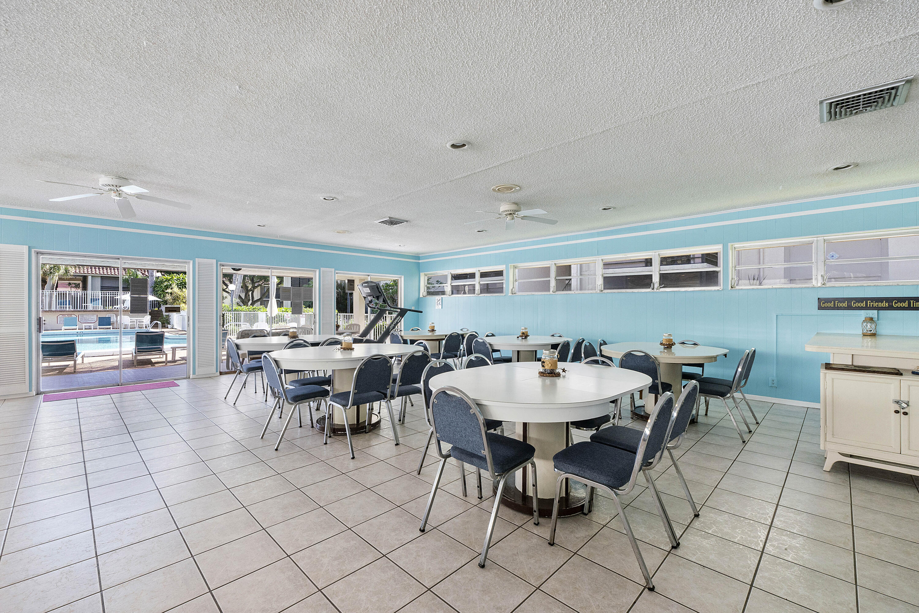 1100 Northwest 13th Street, Unit 192D Boca Raton, FL 33486 - Photo 38 of 42 a view of a dining room with furniture