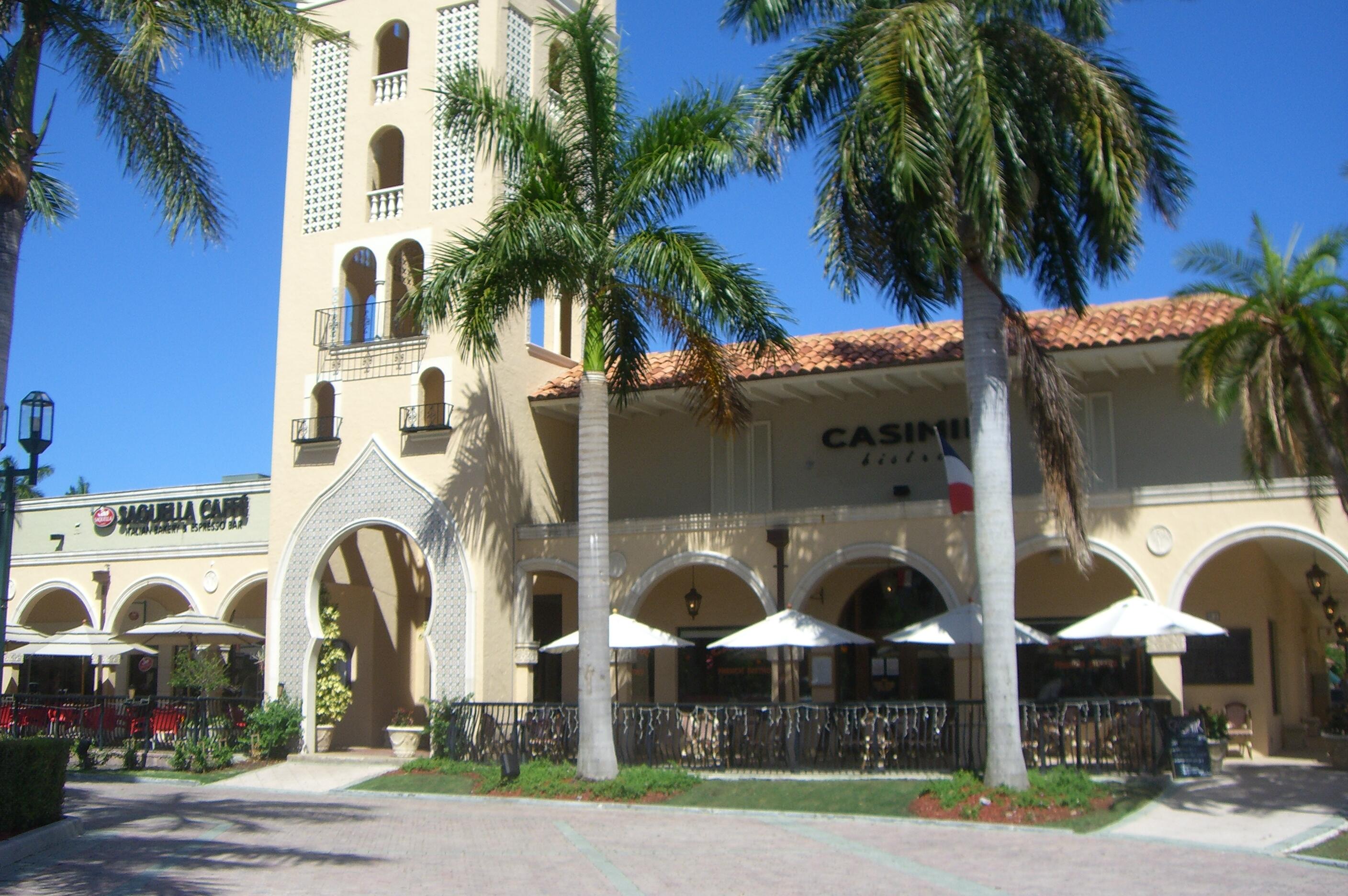 1100 Northwest 13th Street, Unit 192D Boca Raton, FL 33486 - Photo 41 of 42 a front view of multiple houses with yard