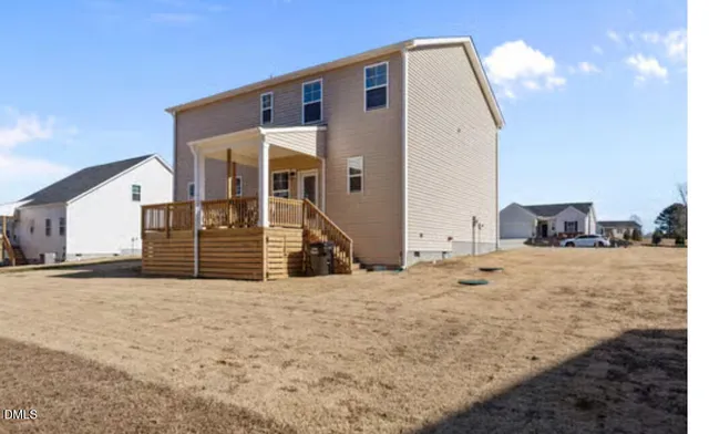 a view of a house with a snow in the yard