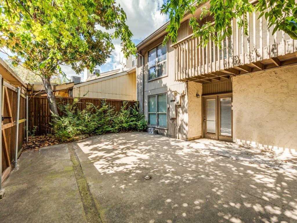 9250 Flickering Shadow Drive Dallas, TX 75243 - Photo 25 of 25 a view of a street with a building in the background