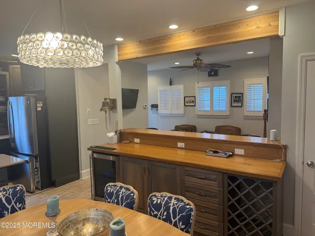 a kitchen with a table and chairs in it