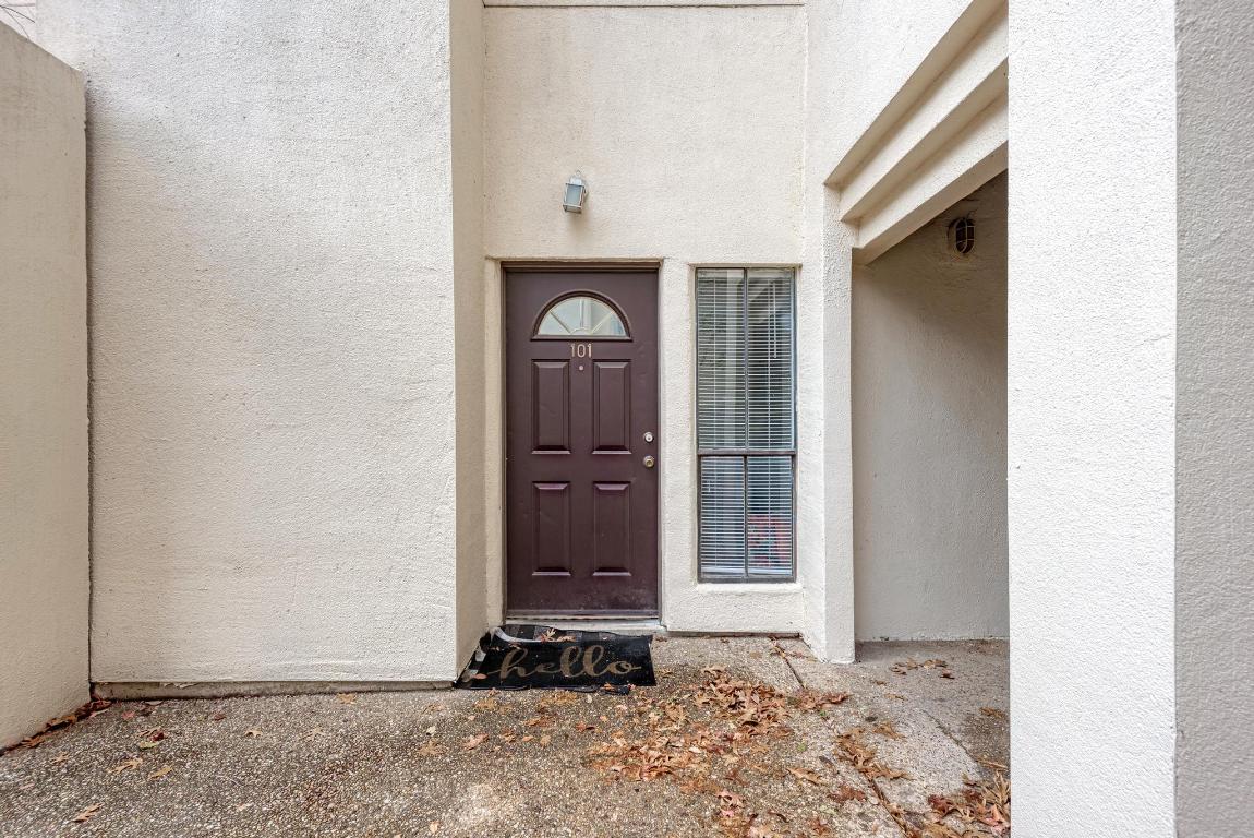 712 Graham Place, Unit 101 Austin, TX 78705 - Photo 5 of 19 Entrance to property featuring stucco siding