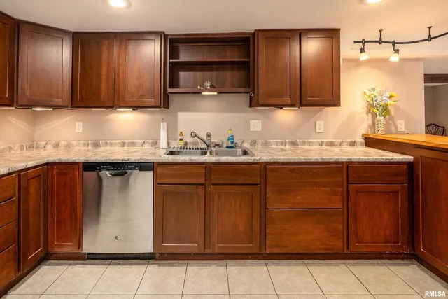a view of an empty room with glass door