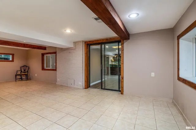 a kitchen with stainless steel appliances granite countertop a refrigerator sink and cabinets