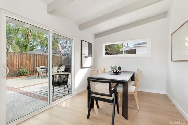 a workspace with furniture and a potted plant