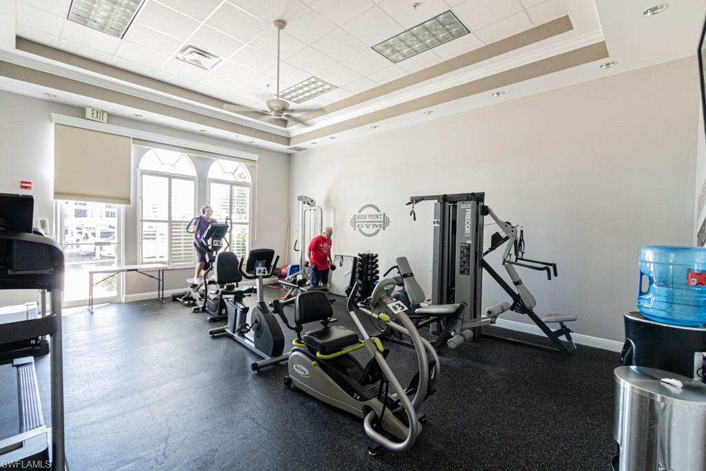1 High Point Circle West, Unit 102 Naples, FL 34103 - Photo 26 of 35 a view of a room with gym equipment