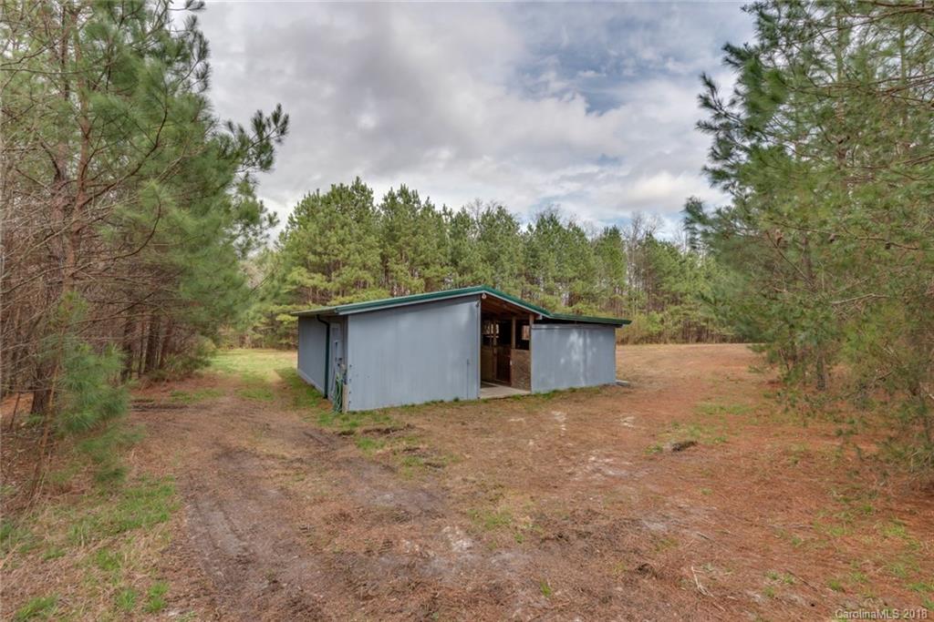 9990 New Cut Road Campobello, SC 29322 - Photo 23 of 31 a view of a house with a yard