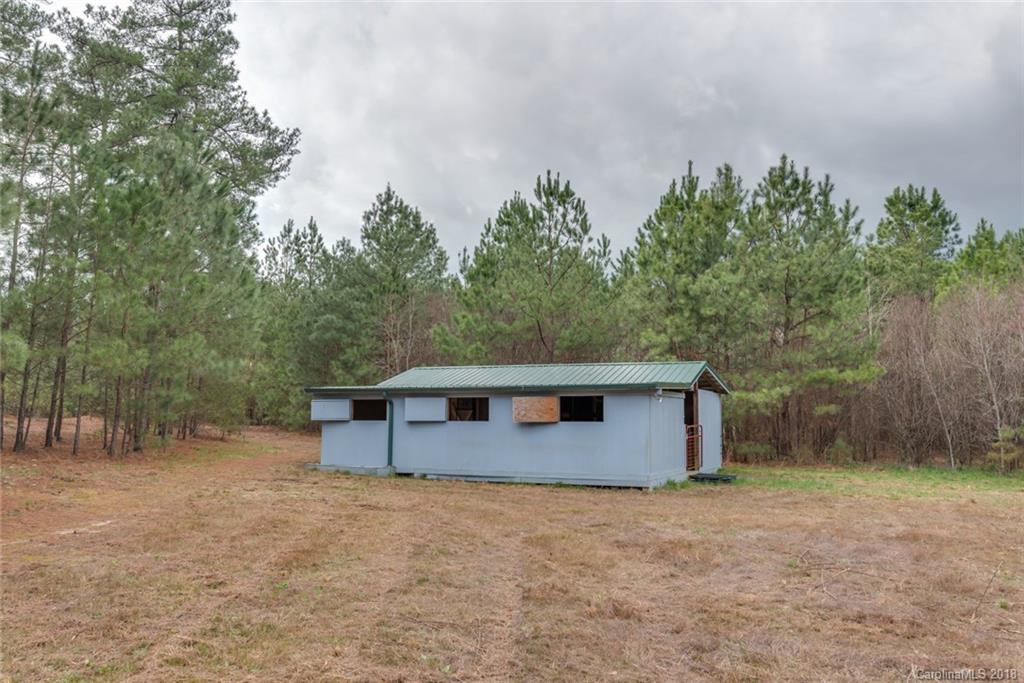 9990 New Cut Road Campobello, SC 29322 - Photo 24 of 31 a backyard of a house with lots of green space