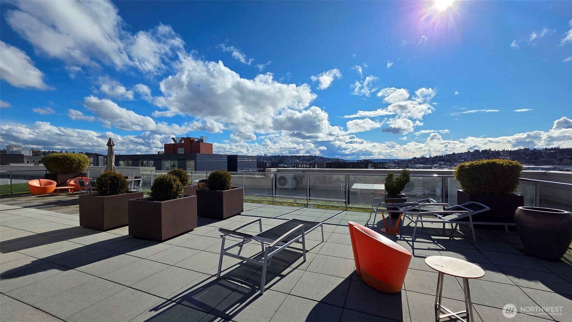 1760 Northwest 56th Street, Unit 309 Seattle, WA 98107 - Photo 31 of 35 a view of a terrace with furniture