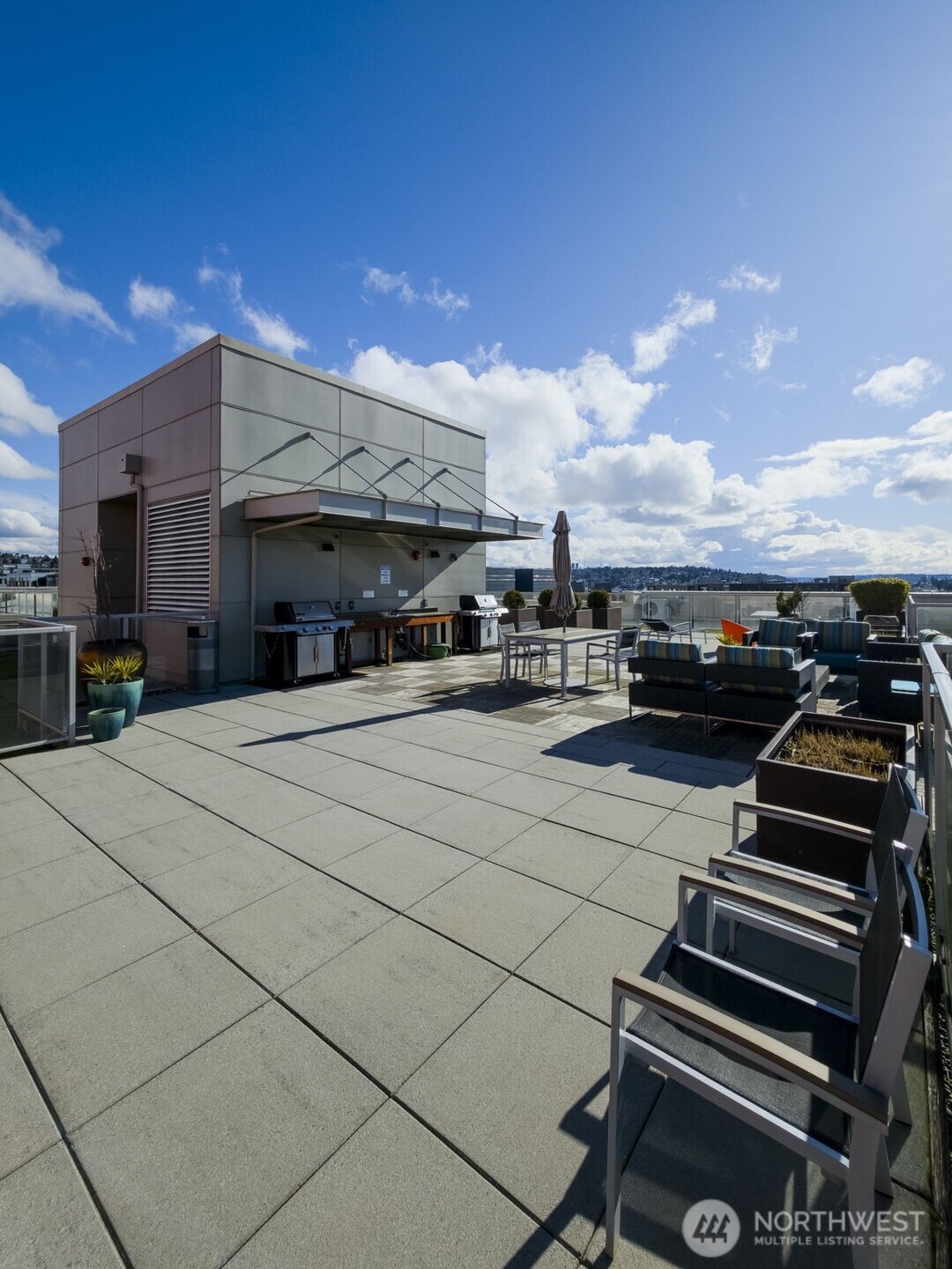 1760 Northwest 56th Street, Unit 309 Seattle, WA 98107 - Photo 34 of 35 a view of the street with seating space