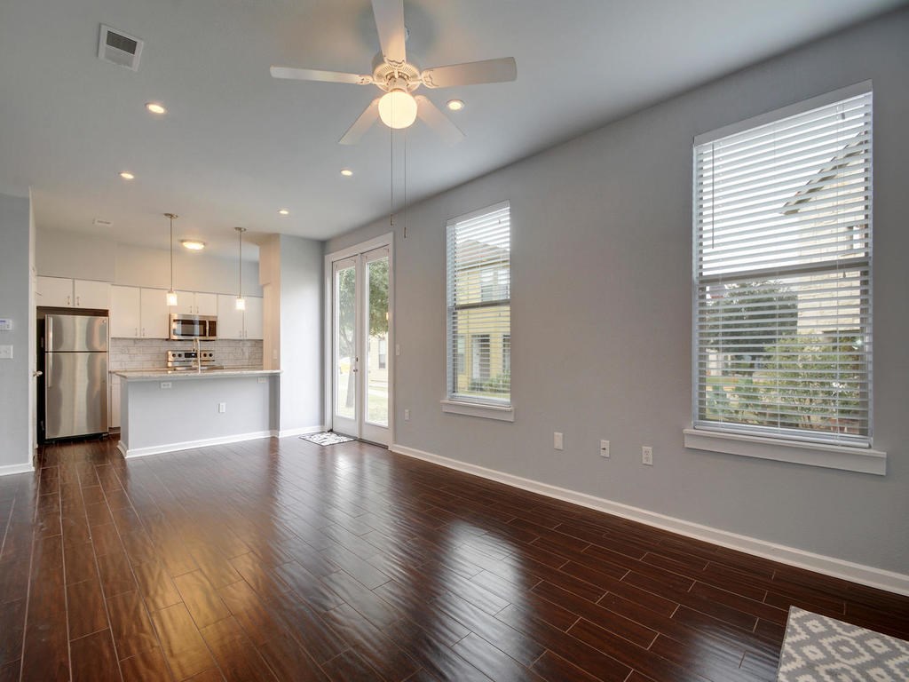 1201 Grove Boulevard, Unit 2304 Austin, TX 78741 - Photo 1 of 1 a view of an empty room with wooden floor and a window