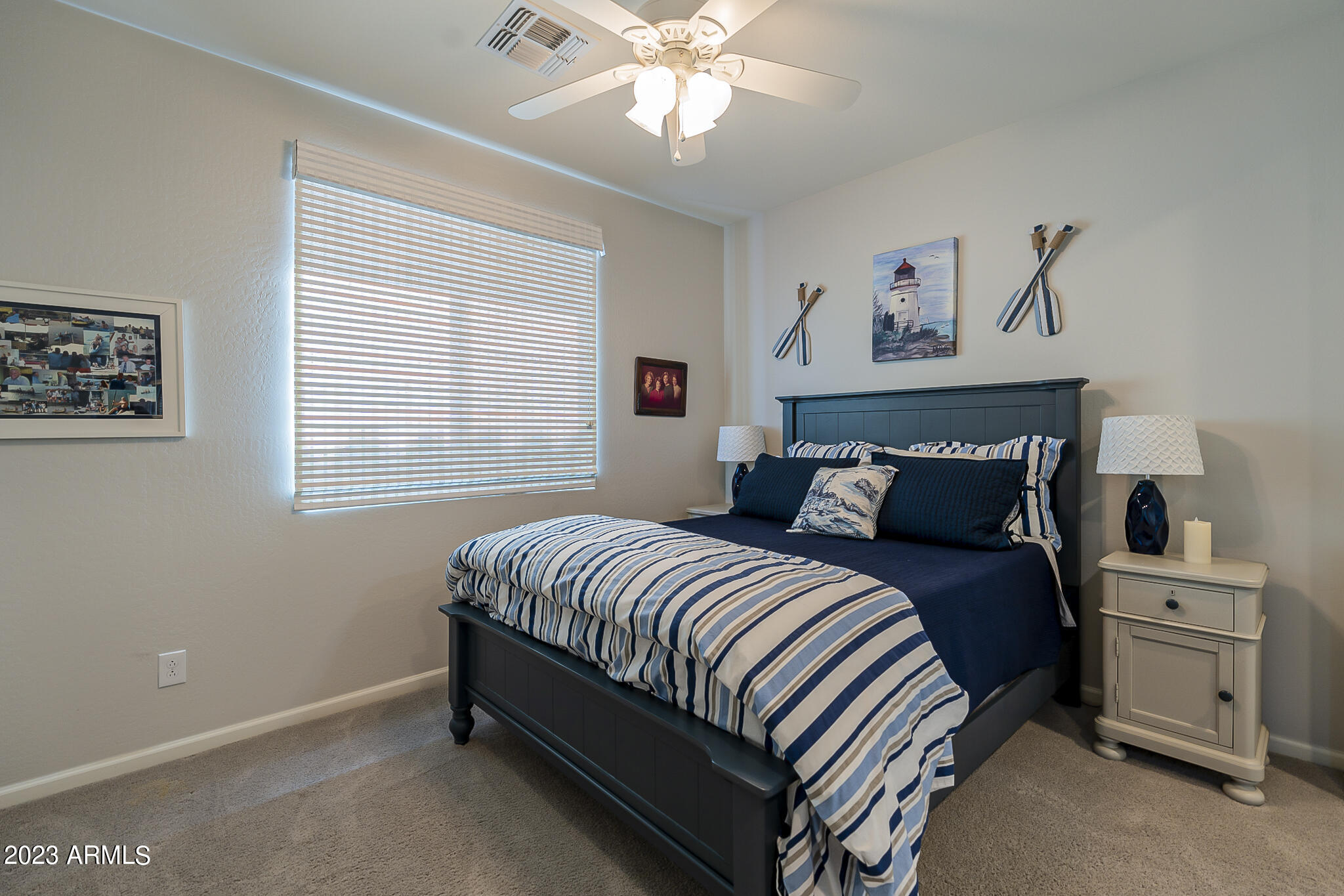 13719 West Linanthus Road Peoria, AZ 85383 - Photo 27 of 38 a bed room with a bed and a window