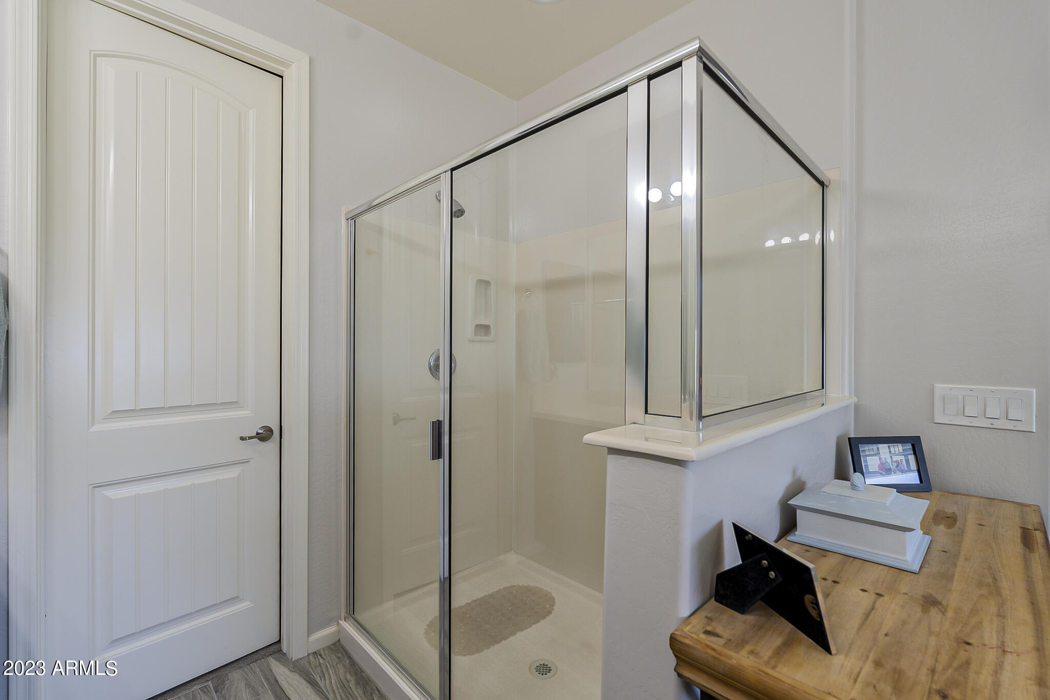 13719 West Linanthus Road Peoria, AZ 85383 - Photo 33 of 38 a bathroom with a mirror and a shower