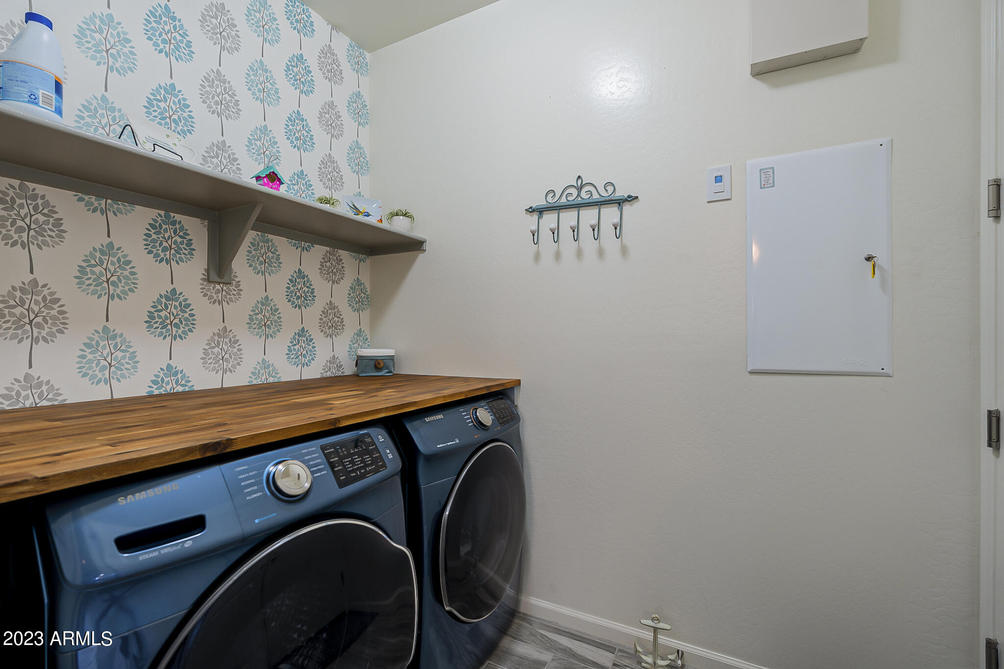 13719 West Linanthus Road Peoria, AZ 85383 - Photo 34 of 38 a utility room with dryer and washer