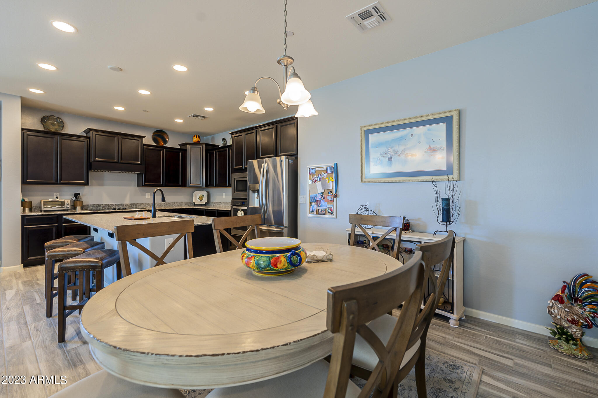 13719 West Linanthus Road Peoria, AZ 85383 - Photo 4 of 38 a view of a dining room with furniture
