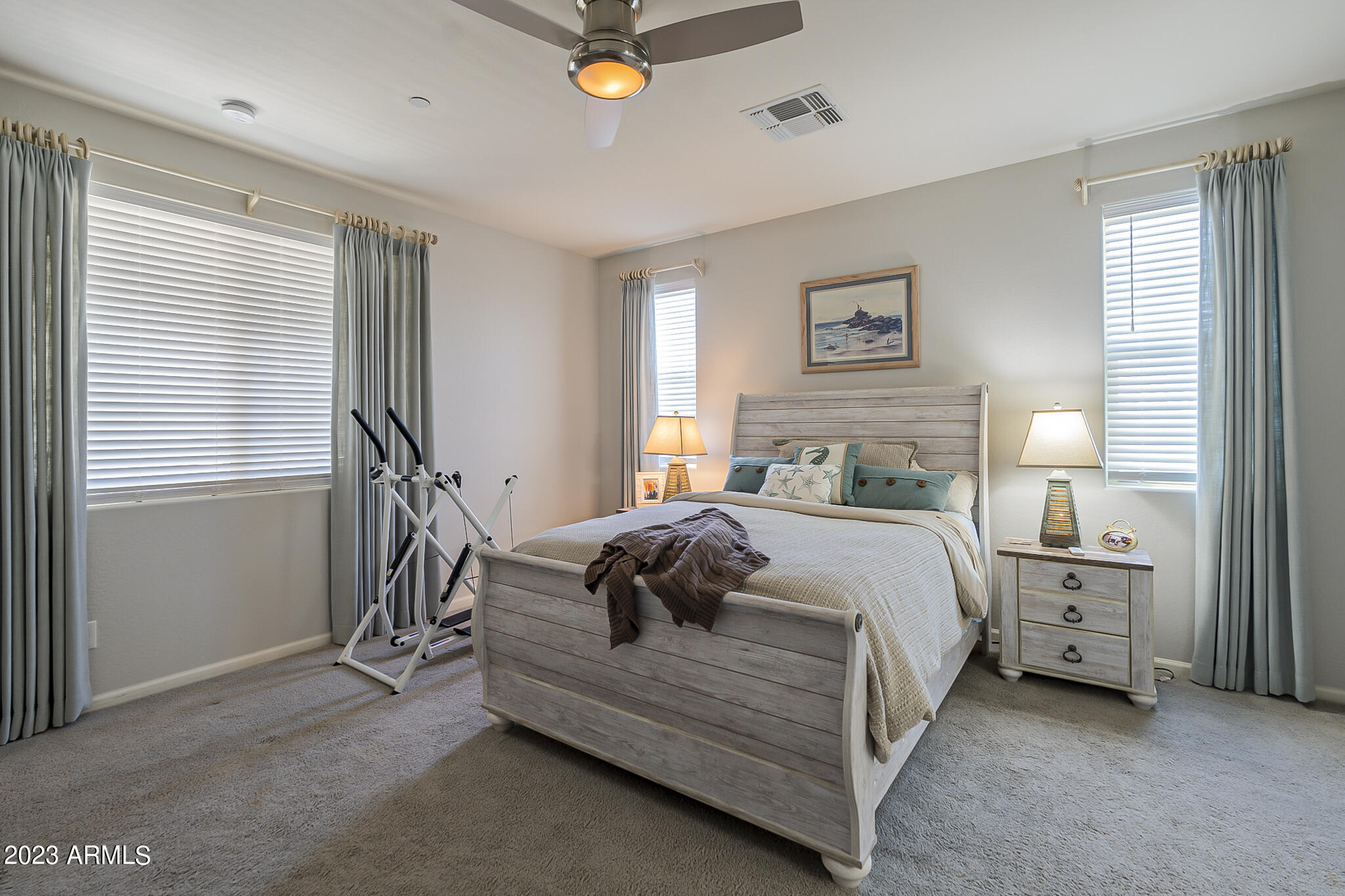 13719 West Linanthus Road Peoria, AZ 85383 - Photo 5 of 38 a bedroom with a bed and window