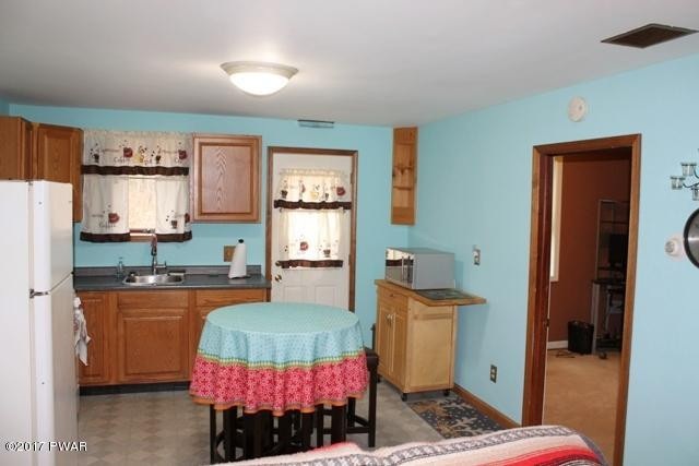 228 Engvaldsen Road Hawley, PA 18428 - Photo 9 of 17 13 Kitchen c