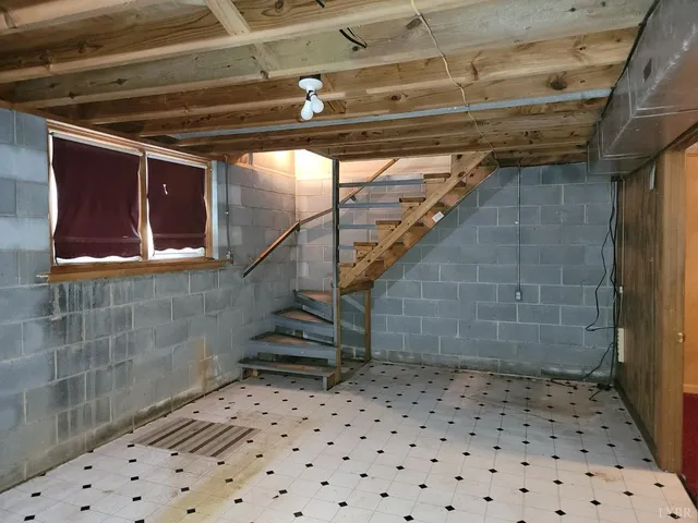 a bathroom with a bathtub sink and mirror