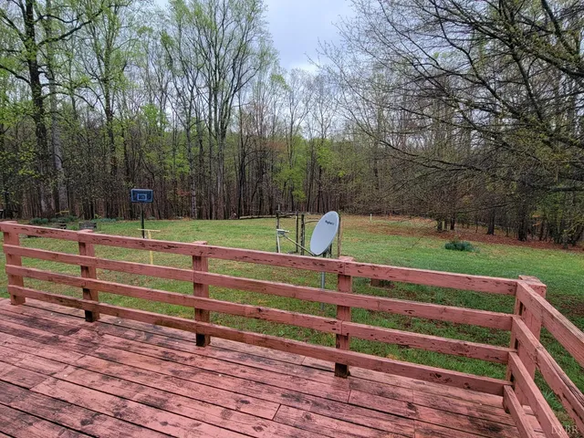 a picture of a room with a floor to ceiling window