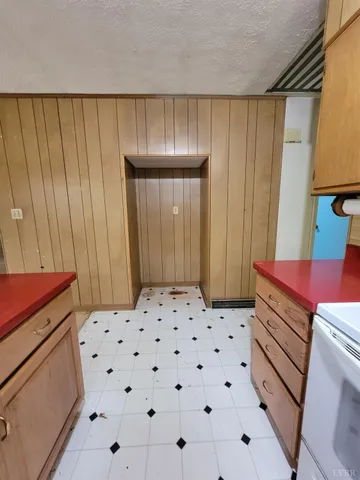 a bedroom with a bed and a cabinets