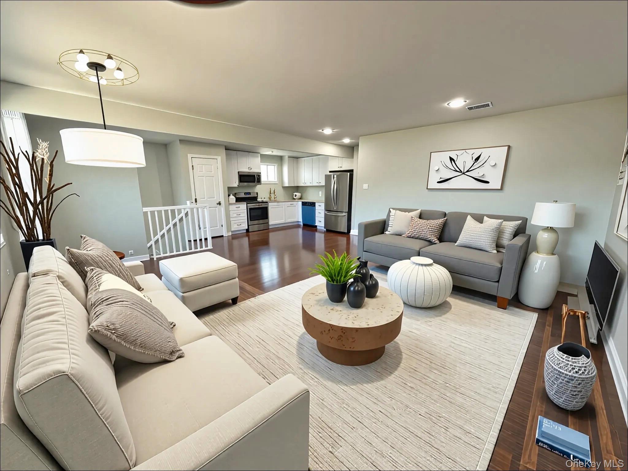 248 East Shore Road Lindenhurst, NY 11757 - Photo 14 of 46 Living area with dark wood finished floors and recessed lighting