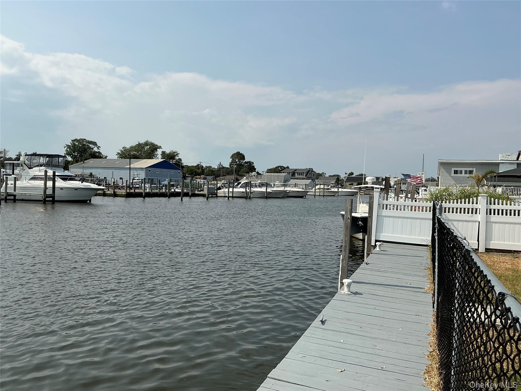 248 East Shore Road Lindenhurst, NY 11757 - Photo 20 of 46 Dock with a water view