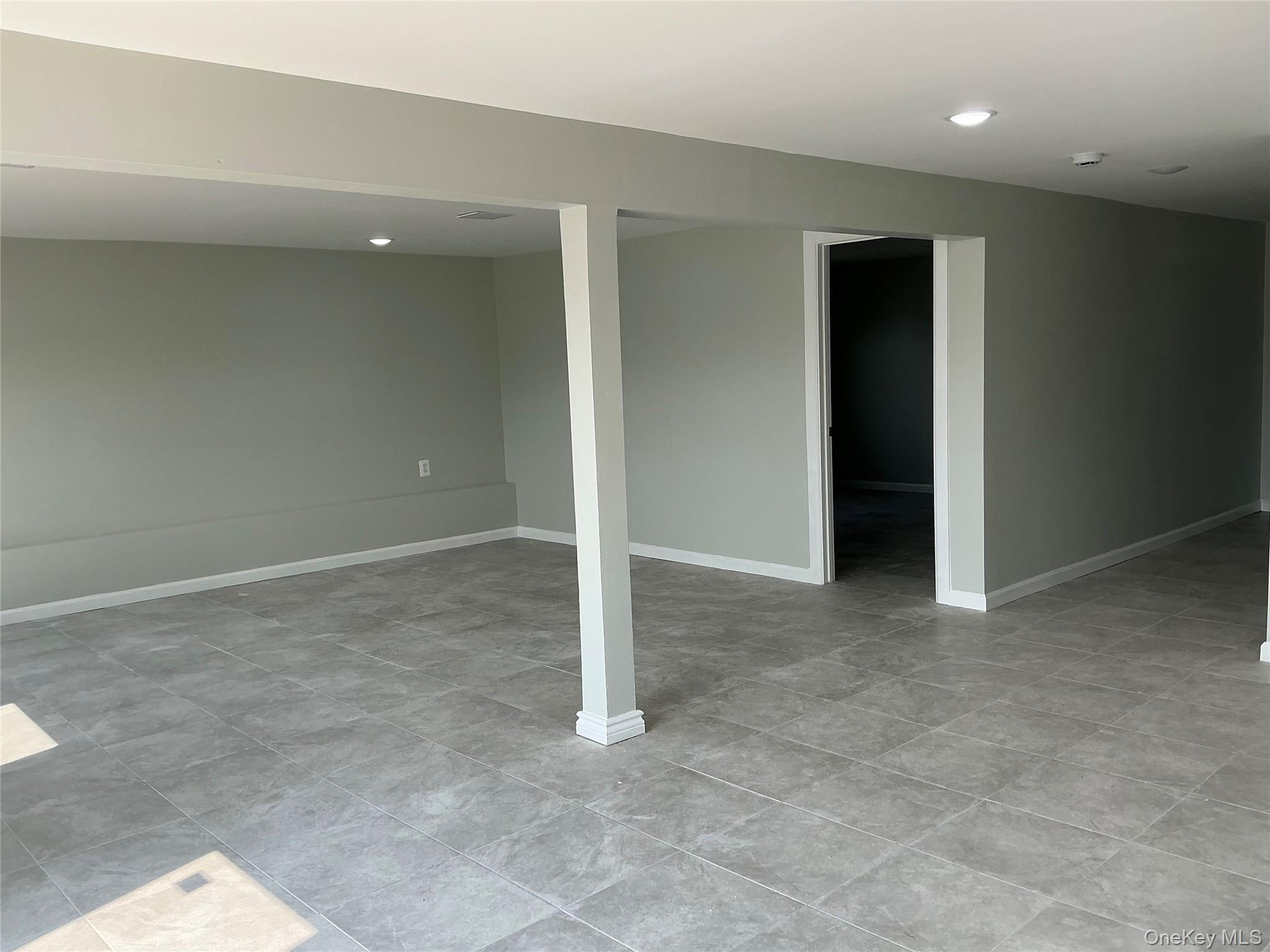 248 East Shore Road Lindenhurst, NY 11757 - Photo 21 of 46 Finished basement featuring recessed lighting