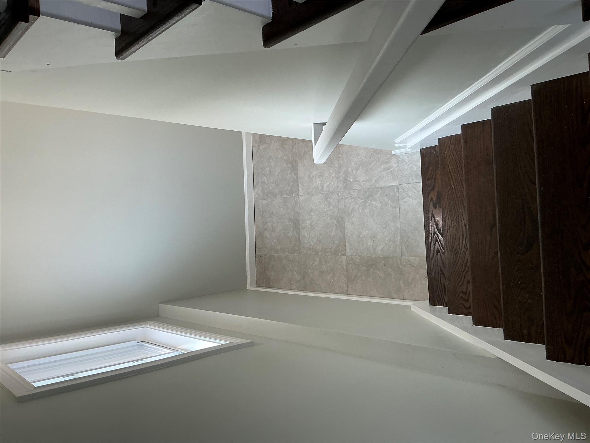 248 East Shore Road Lindenhurst, NY 11757 - Photo 24 of 46 Stairs with baseboards