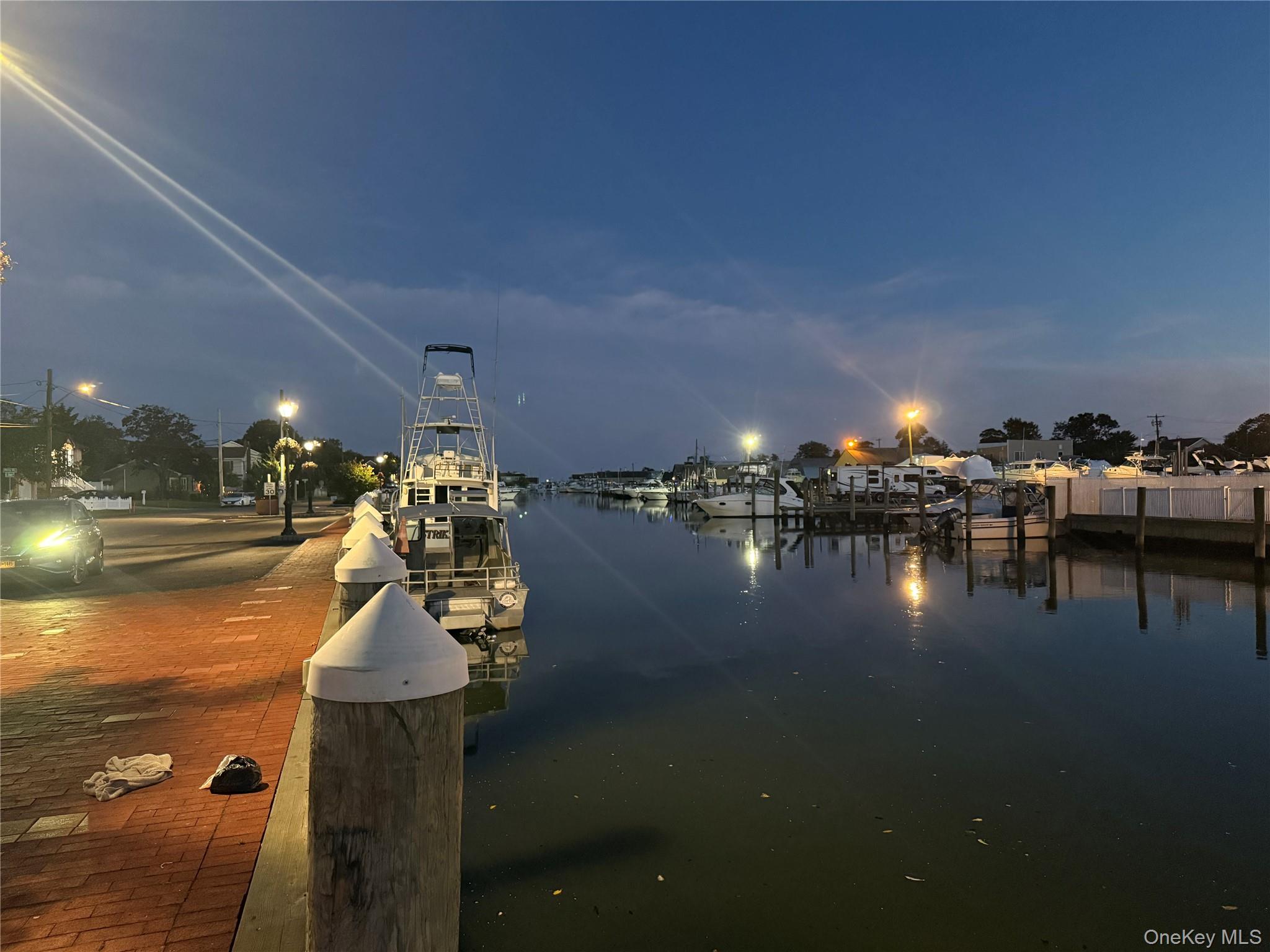 248 East Shore Road Lindenhurst, NY 11757 - Photo 30 of 46 Water view with a boat dock