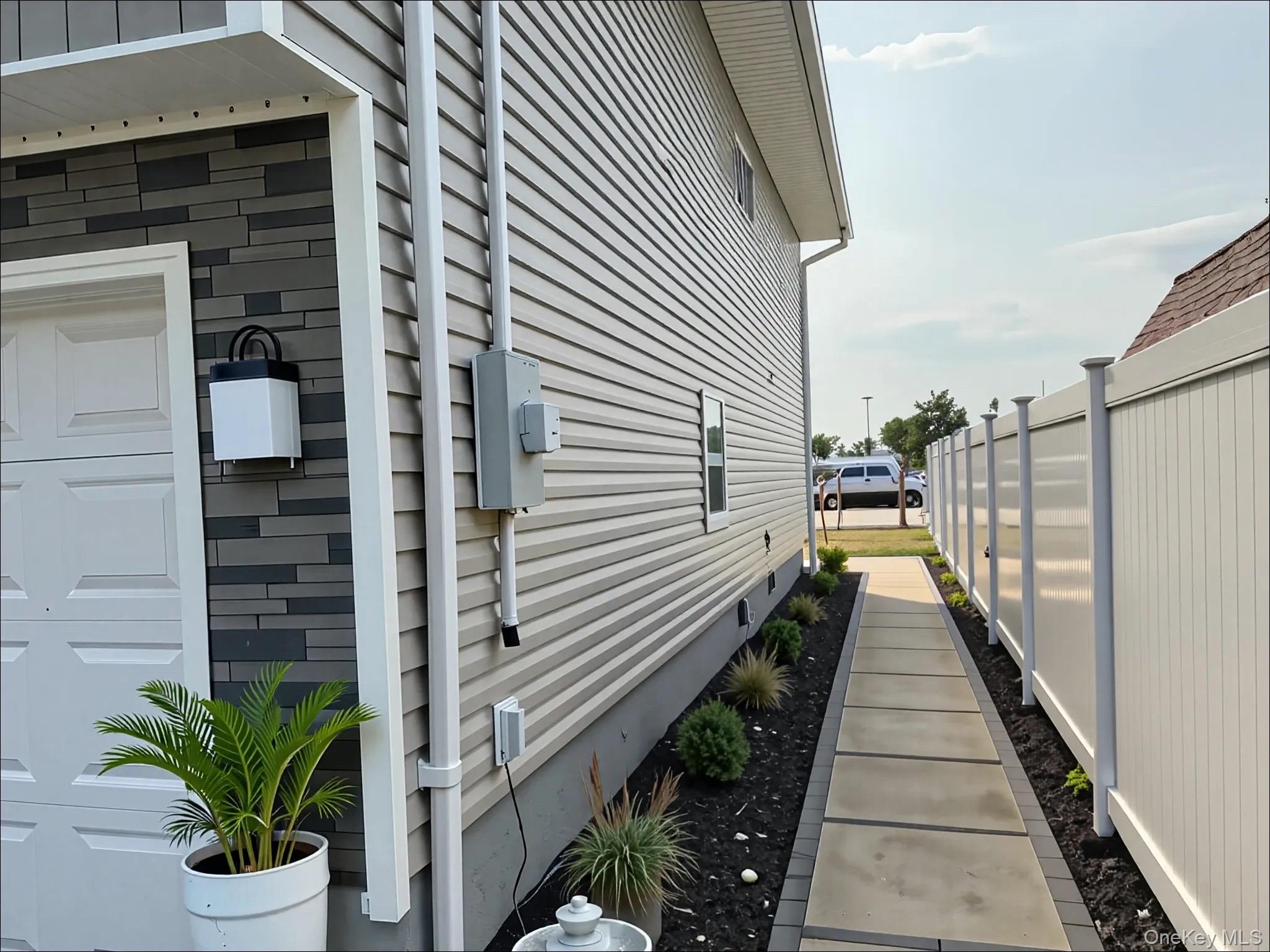 248 East Shore Road Lindenhurst, NY 11757 - Photo 3 of 46 View of home's exterior with crawl space
