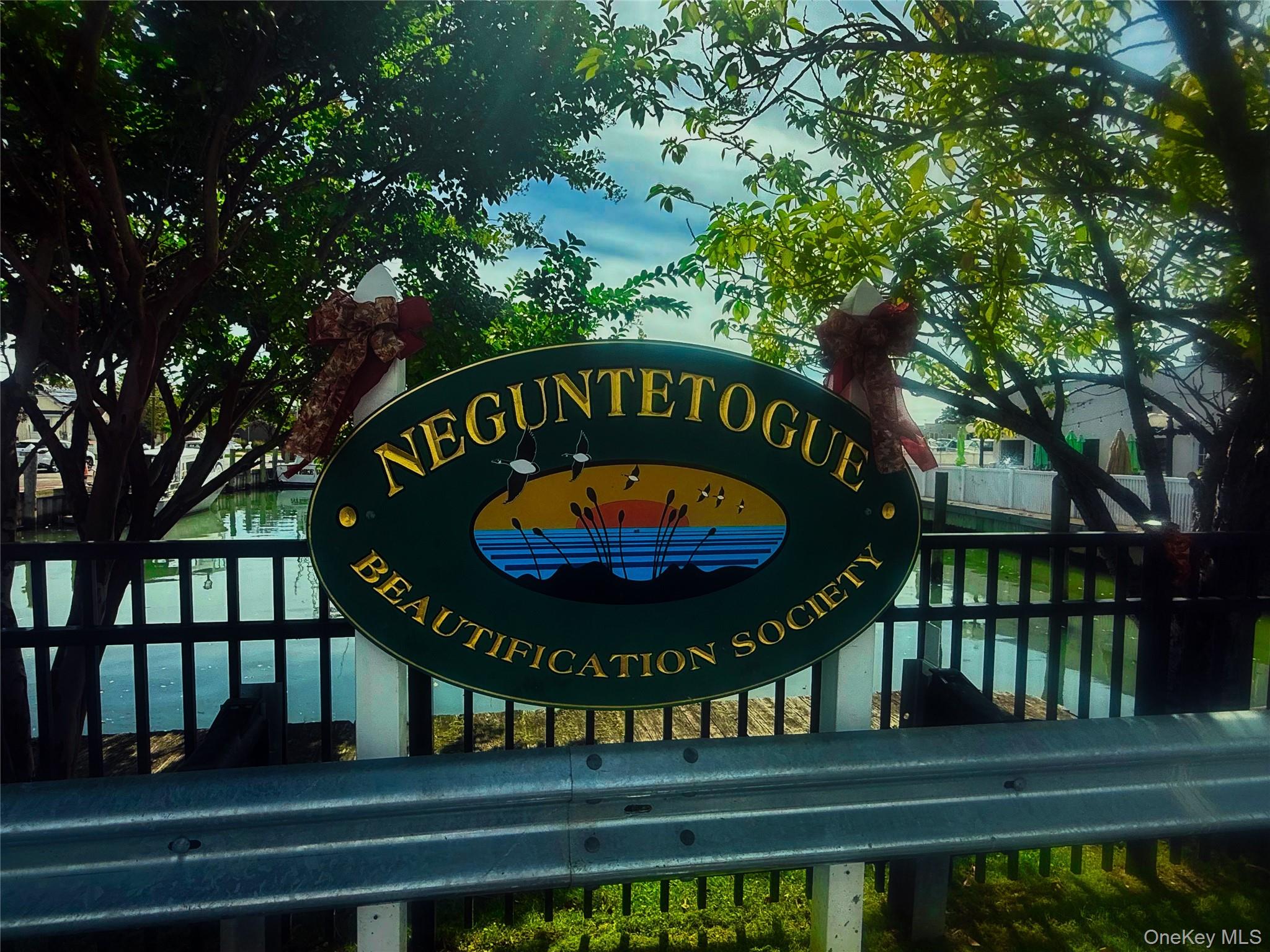 248 East Shore Road Lindenhurst, NY 11757 - Photo 44 of 46 Community / neighborhood sign with a water view