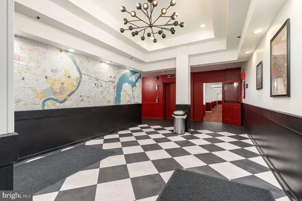 a view of a entryway with a chandelier
