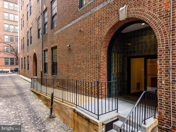 a view of a entrance with stairs