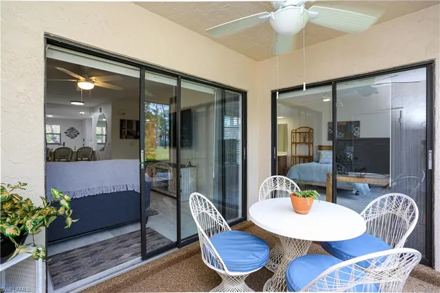 a balcony with furniture and window