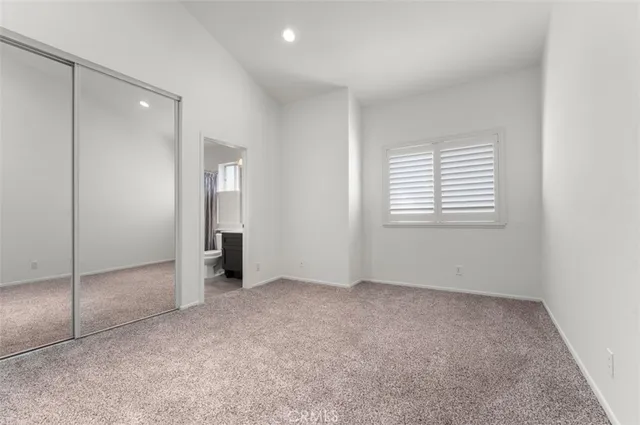 a view of a bathroom with a sink and a mirror