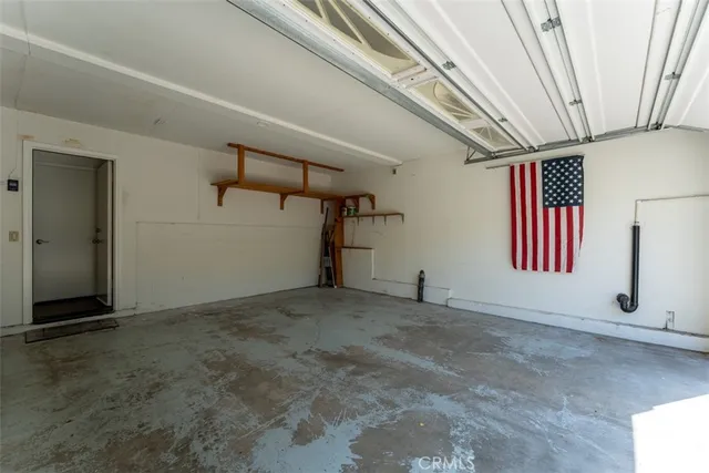 a view of backyard with seating area and trees