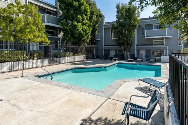 a sign that is in front of flowers