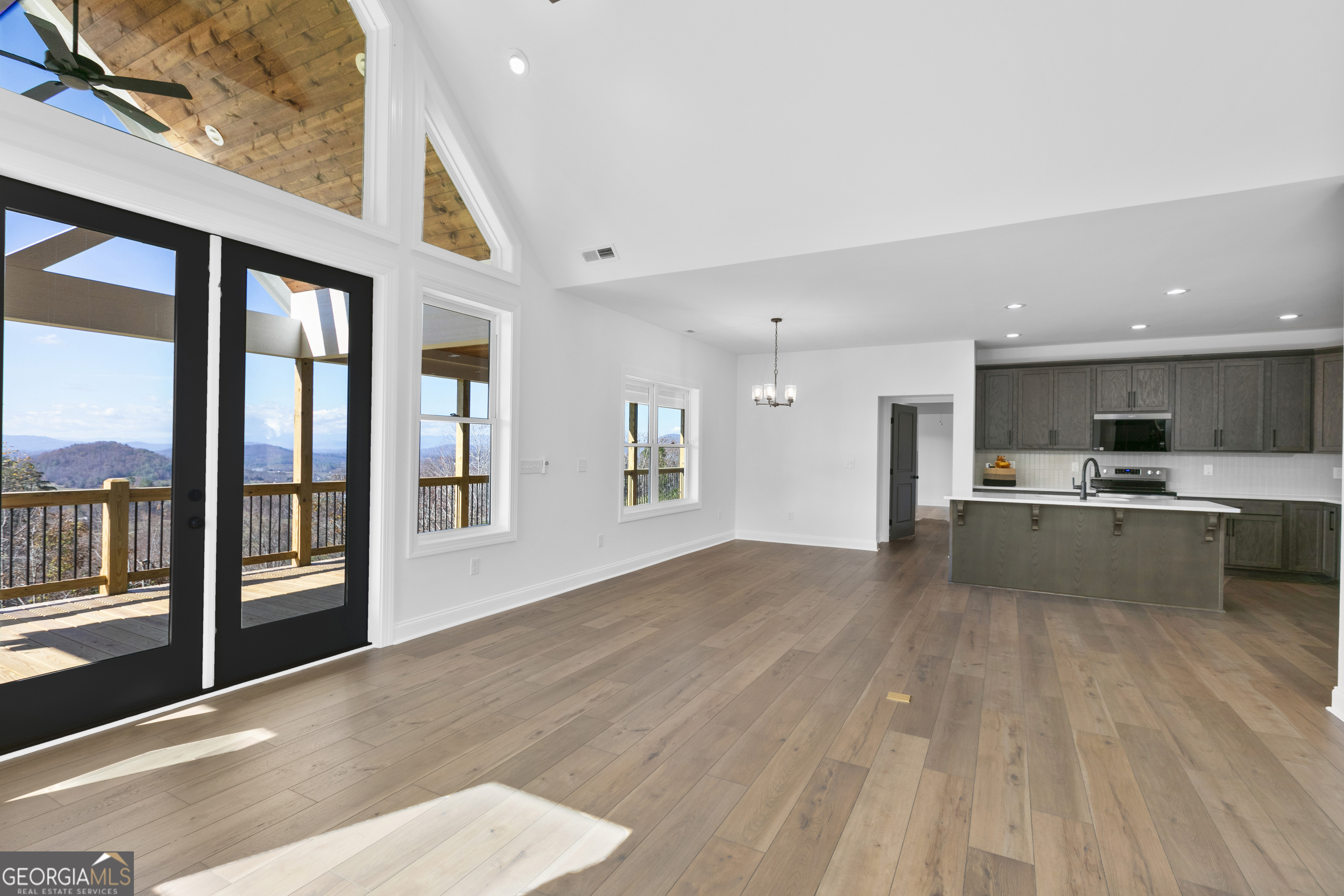 10 Hawks Nest Road, Unit 10 Blairsville, GA 30512 - Photo 12 of 32 a view of large kitchen with granite countertop a large counter top stainless steel appliances and cabinets
