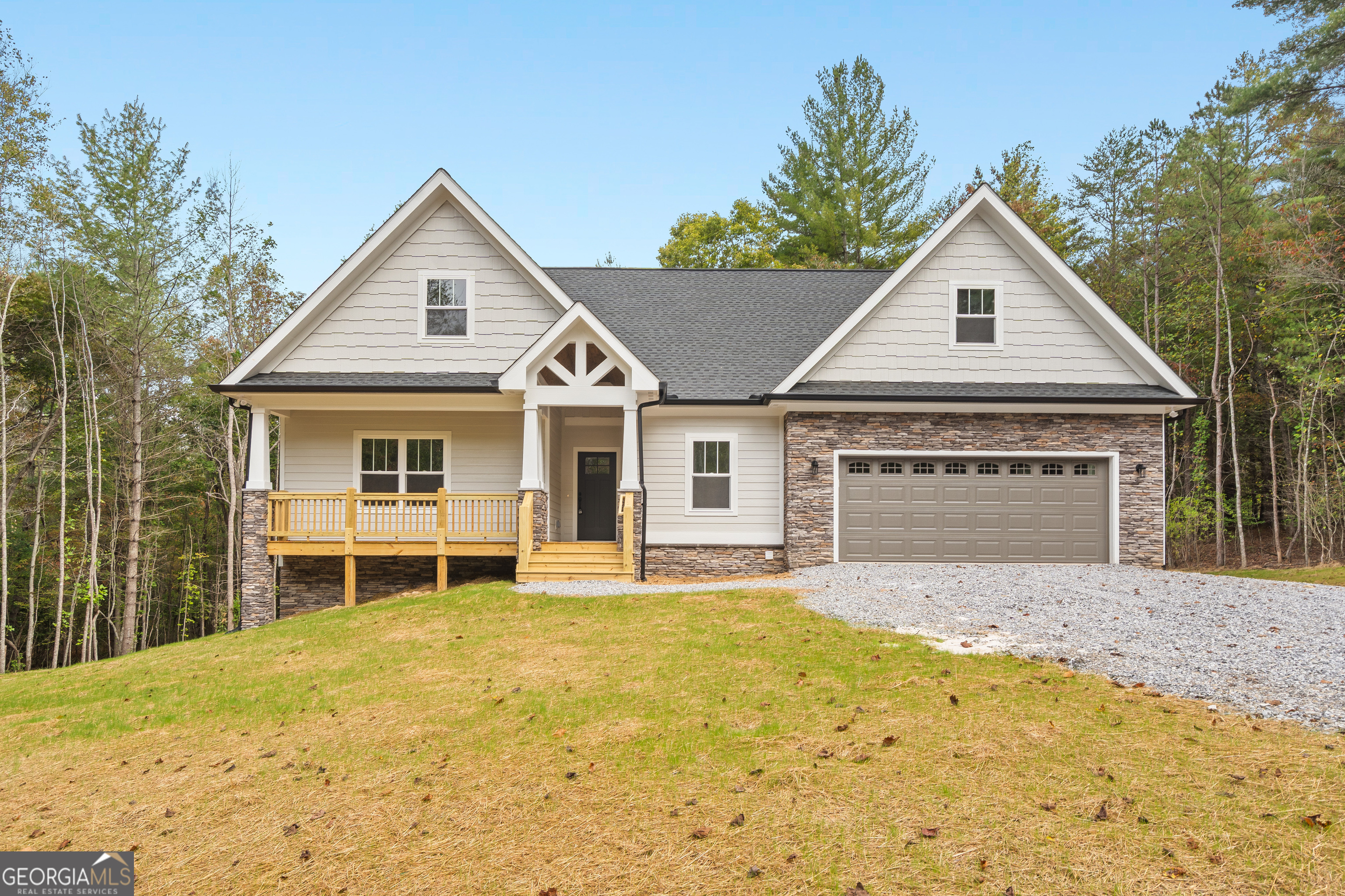 10 Hawks Nest Road, Unit 10 Blairsville, GA 30512 - Photo 29 of 32 a front view of a house with a yard