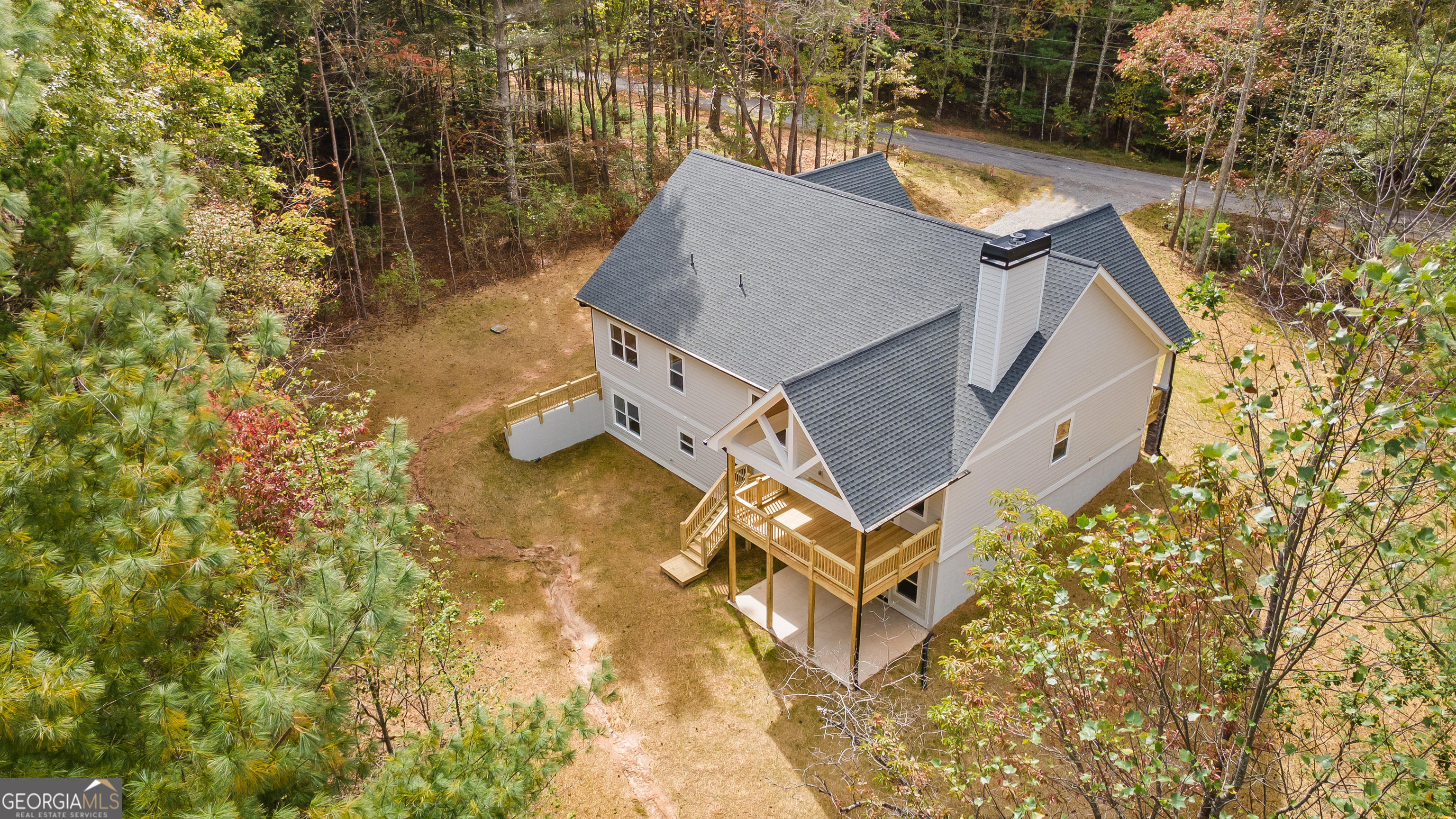 10 Hawks Nest Road, Unit 10 Blairsville, GA 30512 - Photo 6 of 32 an aerial view of a house with yard and parking space