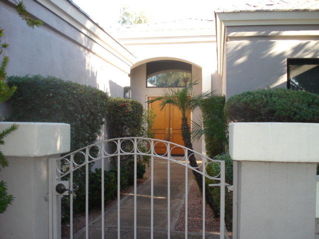 7323 East Gainey Ranch Road, Unit 9 Scottsdale, AZ 85258 - Photo 2 of 16 ENTRY INTO FRONT COURTYARD