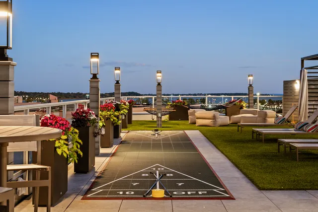 a view of a swimming pool with a patio