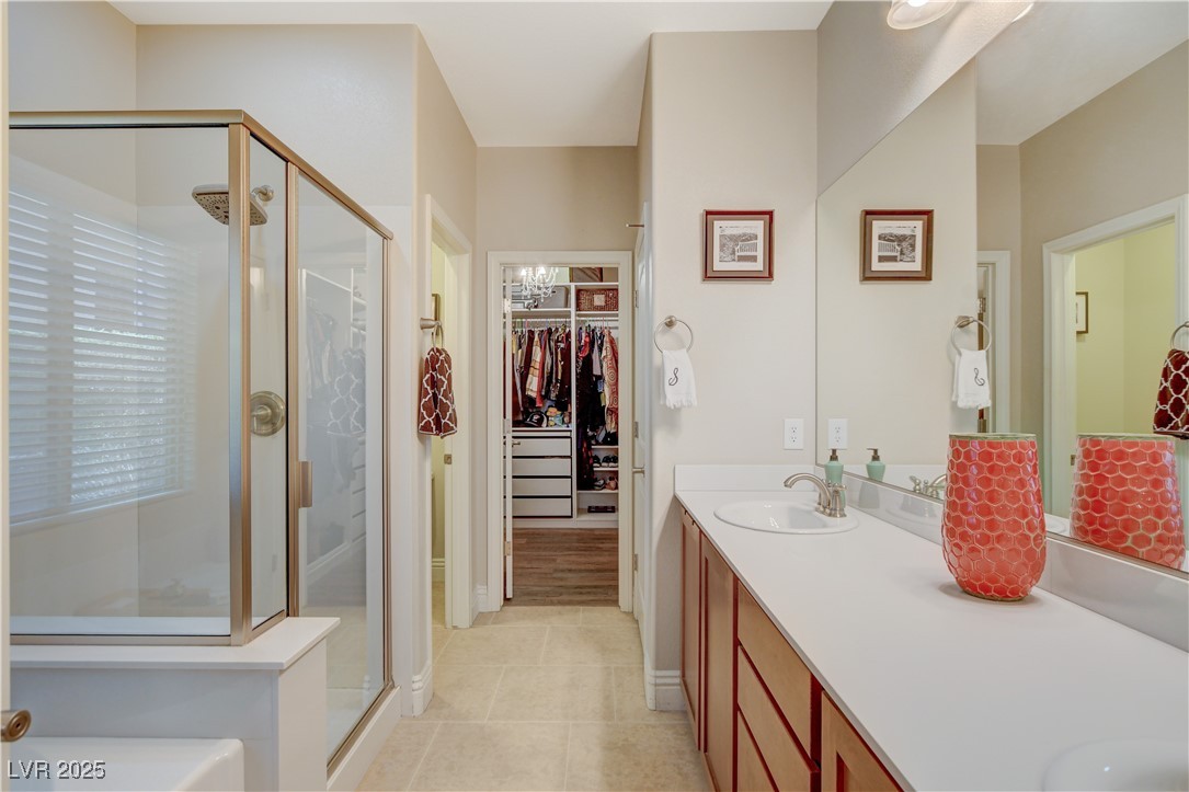 5741 Shadow Bend Drive Las Vegas, NV 89135 - Photo 32 of 78 Full bath featuring a spacious closet, a shower st