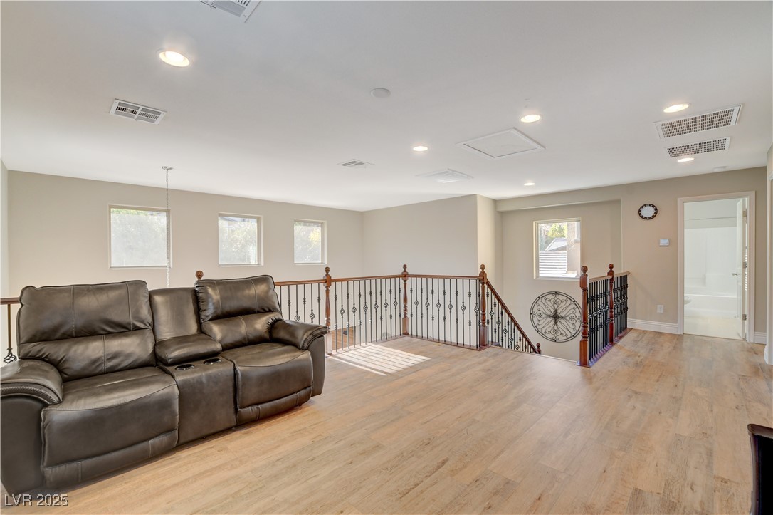 5741 Shadow Bend Drive Las Vegas, NV 89135 - Photo 38 of 78 Living area featuring recessed lighting, baseboard